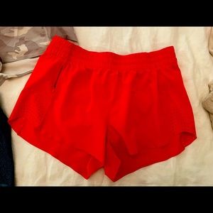 Athlete Hustle 3in orange shorts small